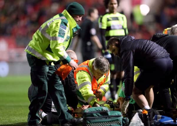 Huddersfield Town's Jonathan Hogg feared the worst when he was taken off by stretcher with a suspected broken neck at Ashton Gate (Picture: Steve Ellis).