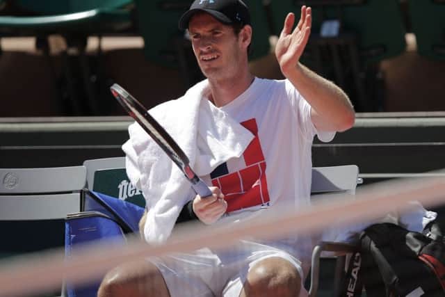 Britain's Andy Murray checks his racket during a training session at Roland Garros on Friday. Picture: AP/Christophe Ena)