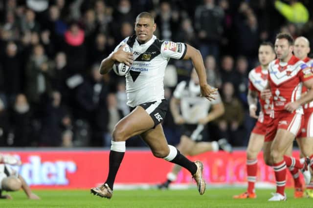 Leon Pryce, scoring a try for Hull FC against Salford City Devils in February last year.  Picture: Bruce Rollinson