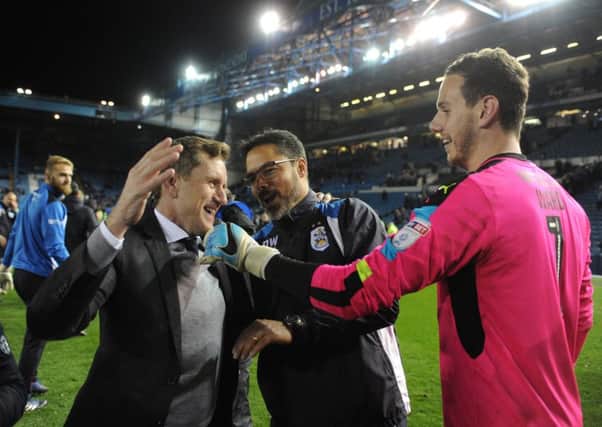 Huddersfield Town chairman Dean Hoyle celebrates with head coach David Wagner and goalkeeper Danny Ward after getting to Wembley after a penalty shootout against Sheffield Wednesday (Picture: Tony Johnson).