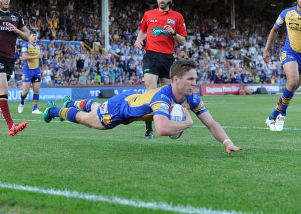 Matt Parcell scores Leeds Rhinos' first try. Picture: Steve Riding