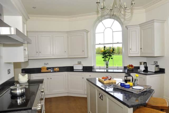 The main house kitchen boasts views across to Hornby Castle