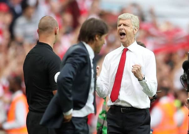 Arsenal manager Arsene Wenger celebrates after the final whistle. Picture: Adam Davy/PA