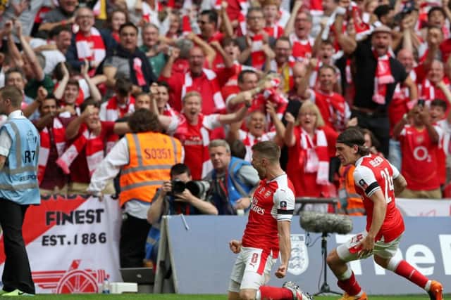 Arsenal's Aaron Ramsey celebrates scoring his side's winning goal against Chelsea at Wembley. Picture: Nick Potts/PA