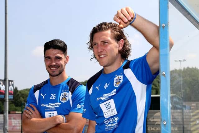 Huddersfield Town's Michael Hefele (right) and Christopher Schindler. Picture: Simon Cooper/PA
