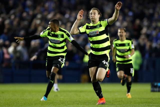 Huddersfield Town's Michael Hefele celebrates after beating Sheffield Wednesday on penalties in the play-off semi-final. Picture: Martin Rickett/PA
