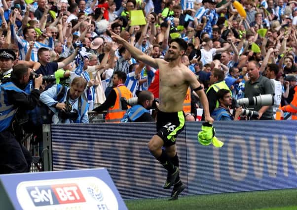 Huddersfield Town's Christopher Schindler celebrates winning the penalty shoot-out against Reading. Picture: Nick Potts/PA