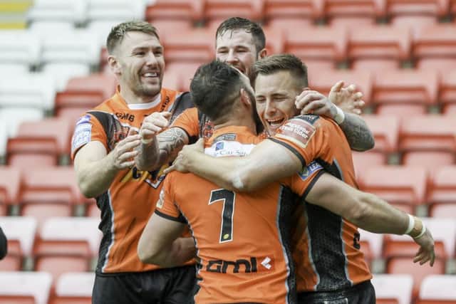 No stopping him: Castleford Tigers Greg Eden celebrates scoring their fourth try against Leigh. (Picture: Paul Currie/SWpix.com)