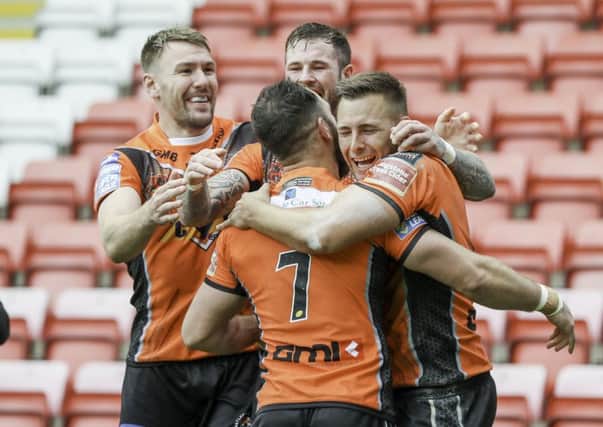 No stopping him: Castleford Tigers Greg Eden celebrates scoring their fourth try against Leigh. (Picture: Paul Currie/SWpix.com)