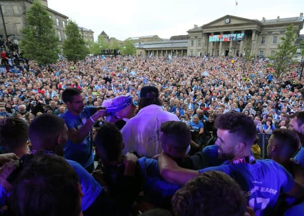 Huddersfield Town's homecoming parade, but will Premier League football transform the town?