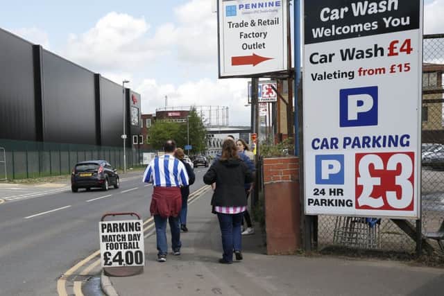 Match parking for fans at Huddersfield Town.