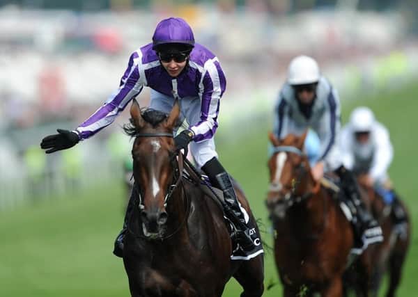 Camelot (left) ridden by Joseph O'Brien wins The Investec Derby in 2012.
