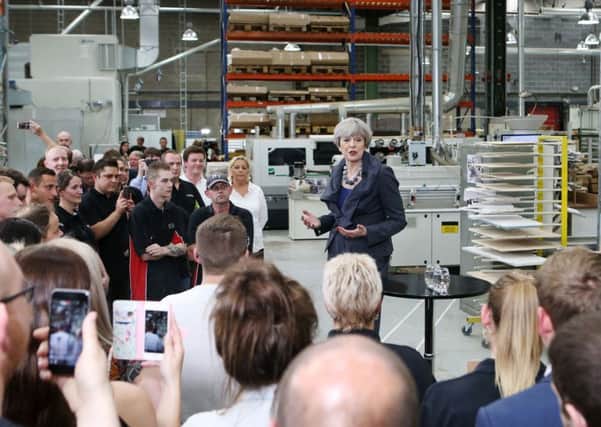 Theresa May, campaigning in Moorthorpe on Thursday.