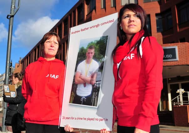 6 February 2015 .......   Michelle Feather and Rebecca Wright, mother and sister of Andrew Feather protest outside Leeds Crown Coart along with the families of two other men convicted for the brutal murder of Bradford man Barry Selby. They say Andrew Feather, Joseph Lowther and Robert Woodhead were wrongly convicted under the joint enterprise doctrine. 
TJ100704j Picture Tony Johnson