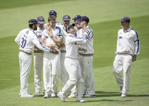 Ben Coad is congratulated after removing Lancashires Shivnarine Chanderpaul, a pivotal wicket that helped Yorkshire towards a three-day Roses victory over Lancashire (Picture: Allan McKenzie/SWpix.com).