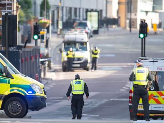 Police officers in London after Saturday night's terror attack