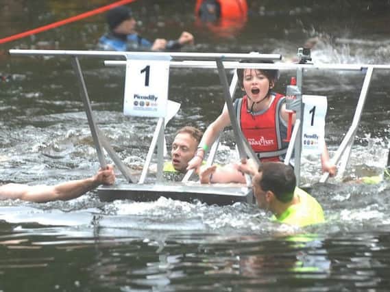 A crowd of thousands is expected to cheer on the 90 teams of heroes and villains straining up cobbled streets and wading through the River Nidd