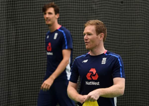 England captain Eoin Morgan and Steven Finn during the nets session at Cardiff Wales Stadium yesterday (Picture: Joe Giddens/PA Wire).