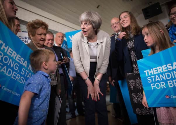 Theresa May campaigned on Saturday in Dewsbury, one of the Tory target seats in the region.