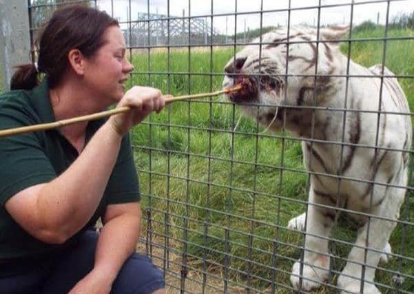Rosa King, 33, who has died after being mauled by a tiger at Hamerton Zoo, Cambridgeshire.