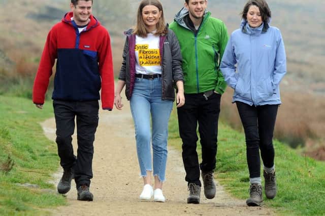 .Jonathan Barnicott who has cystic fibrosis (left) and his friends Jo Stevenson, Lewis Bates and Ellie Marlow who are doing a 40 mile walk in a single day to raise money for research into the condition. Picture Scott Merrylees