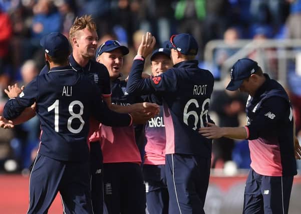 England's Jake Ball celebrates the wicket of New Zealand's Ross Taylor.