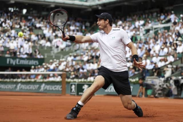 Britain's Andy Murray plays a shot against Japan's Kei Nishikori during their quarter-final match of the French Open tennis tournament. (AP Photo/Petr David Josek)
