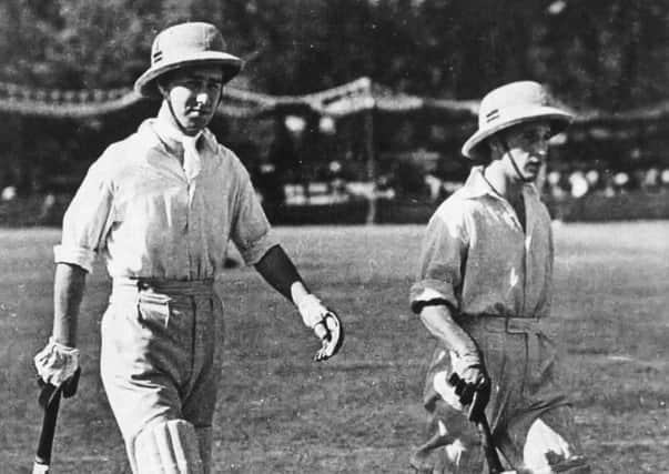 Norman Yardley,

Yorkshire's Gentleman Cricketer,
 and Bill Edrich walk out to bat in their pith helmets