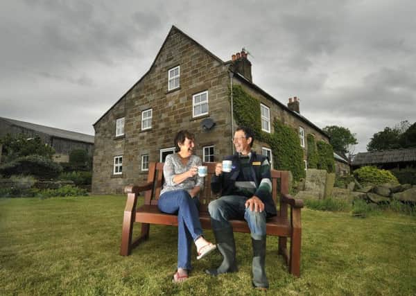 Judith and Rob Ventress take a well earned break as Judith runs the family Bed and Breakfast while Rob works on Intake Farm Littlebeck. Picture by Richard Ponter.