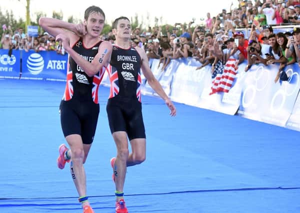 AlistairBrownlee helping his younger brother Jonny is an image that continues to personify the triathletes.