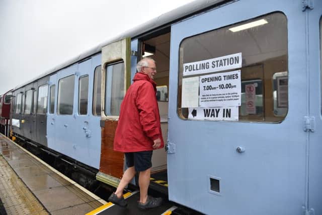 A polling station in a train carriage at Leeming Bar Station, North Yorkshire. Picture: SWNS