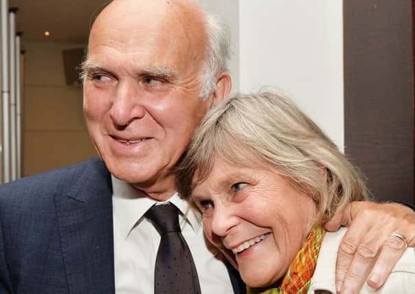 Sir Vince Cable is congratulated by his wife Rachel after being re-elected as the MP for Twickenham at Twickenham Stadium in London. PRESS ASSOCIATION Photo.
