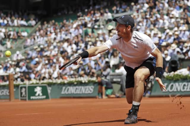 Britain's Andy Murray plays a shot against Switzerland's Stan Wawrinka during their semifinal match of the French Open tennis tour Picture: AP/Petr David Josek.