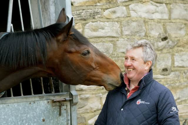 Trainer Bryan Smart with Kentucky Connection at his stables at Hambleton.