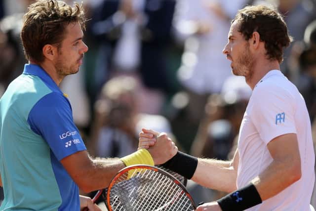 Stan Wawrinka shakes hands with Andy Murray after their French Open semi-final. Picture: AP Photo/David Vincent)