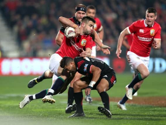 British and Irish Lions' Conor Murray is tackled during the tour match at the AMI Stadium (Photo: PA)
