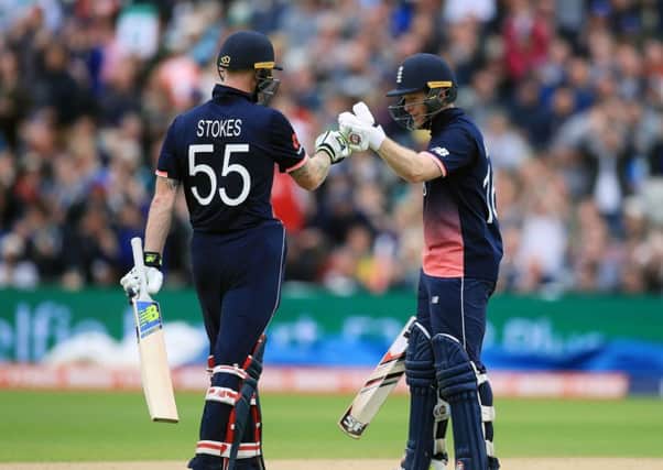 England's Ben Stokes (left) and Eoin Morgan spur each other on during their team's run chase against Australia.. Picture: Mike Egerton/PA