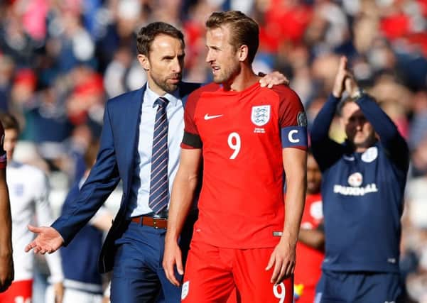 England manager Gareth Southgate (left) and Harry Kane after the final whistle at Hampden Park. Picture: Martin Rickett/PA