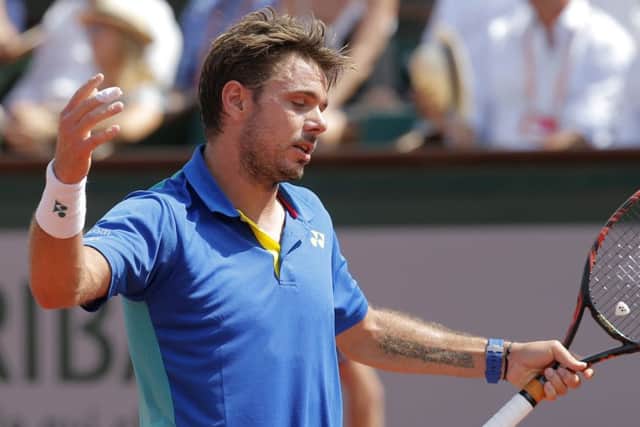 Stan Wawrinka shows his frustration in the men's singles final of the French Open against Rafael Nadal in Paris on Sunday. Picture: AP/Michel Euler.
