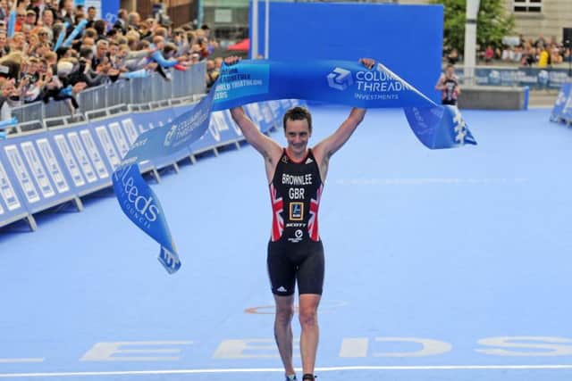 Alistair Brownlee wins the Elite Mens Race with brother Jonny second in the Columbia Threadneedle World Triathlon in Leeds. Picture: Tony Johnson.
