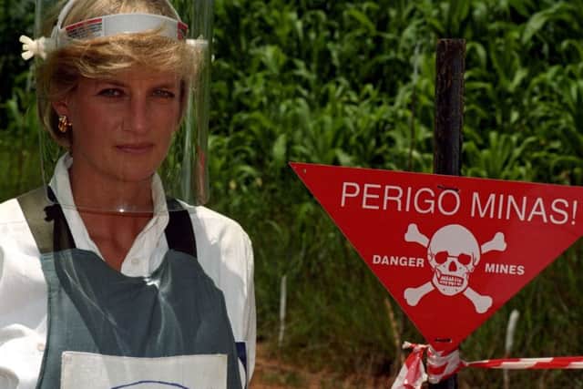 Diana, Princess of Wales, visiting a minefield in Angola in 1997. (PA).