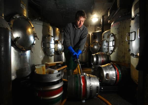 Brewer Dan Gent barrels the latest batch at the Salamander Brewery in Bradford, one of many micro-breweries in Yorkshire.