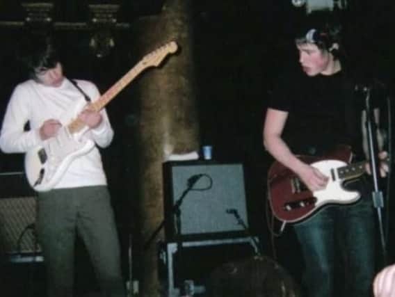 The band take to the stage at The Grapes in 2003.