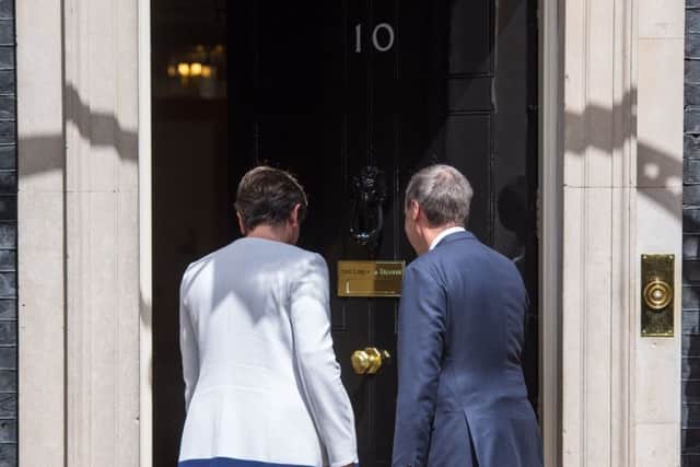 Should we turn our backs on them? DUP leader Arlene Foster and DUP deputy leader Nigel Dodds arriving at 10 Downing Street in London for talks on a deal to prop up a Tory minority administration. Picture: Dominic Lipinski/PA Wire
