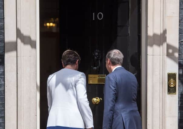 Should we turn our backs on them? DUP leader Arlene Foster and DUP deputy leader Nigel Dodds arriving at 10 Downing Street in London for talks on a deal to prop up a Tory minority administration. Picture: Dominic Lipinski/PA Wire