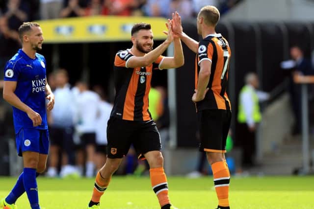 Hull City's Robert Snodgrass, left, and David Meyler celebrate after downing the champions