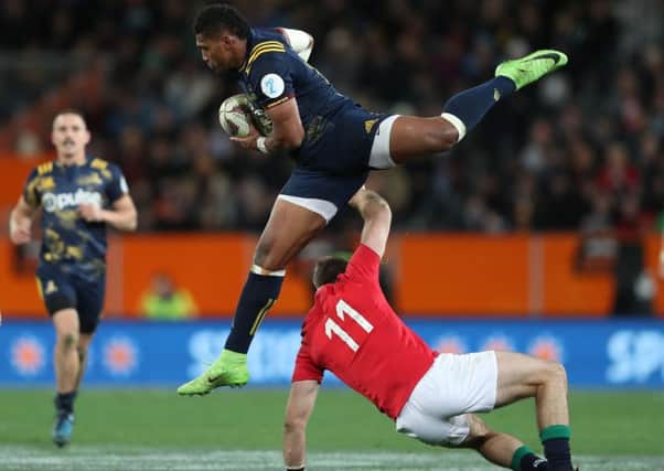 Highlanders' Waisake Naholo is tackled by British and Irish Lions' Tommy Seymour during the tour match at Forsyth Barr Stadium, Dunedin. (Picture: David Davies/PA Wire)