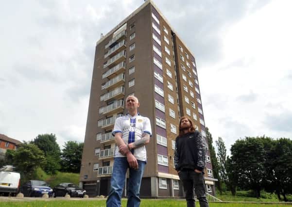 Residents Carl Ackroyd and Antony Johnstone oustide the Poplar Mount flats in Bramley. Picture: Tony Johnson