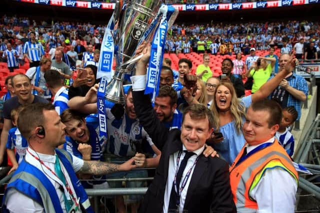 Huddersfield Town chairman Dean Hoyle celebrates Championship play-off success with the club's fans at Wembley. Picture: Nick Potts/PA