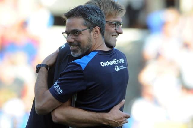 WE'LL MEET AGAIN ... TWICE: David Wagner with his Liverpool and his good friend Jurgen Klopp will pit their wits against each other in October and January. Picture: Tony Johnson.
